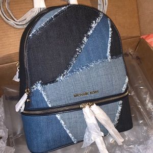 rhea medium frayed denim backpack